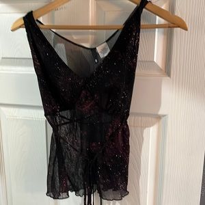 Sparkle and shine in this cute sheer camisole